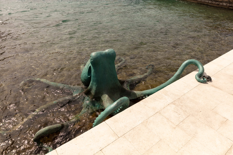 Bronze octopus sculpture on the pier