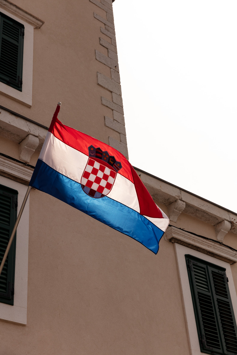 Croatian flag on a stone facade